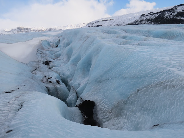 Ice picking iceland glacier walk