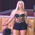 Nicki Minaj wears bra-top 3-sizes too small..and her boobs hang out all over the place (photos)