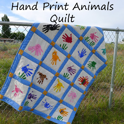 http://www.piecesbypolly.com/2011/06/hand-print-animals-quilt.html