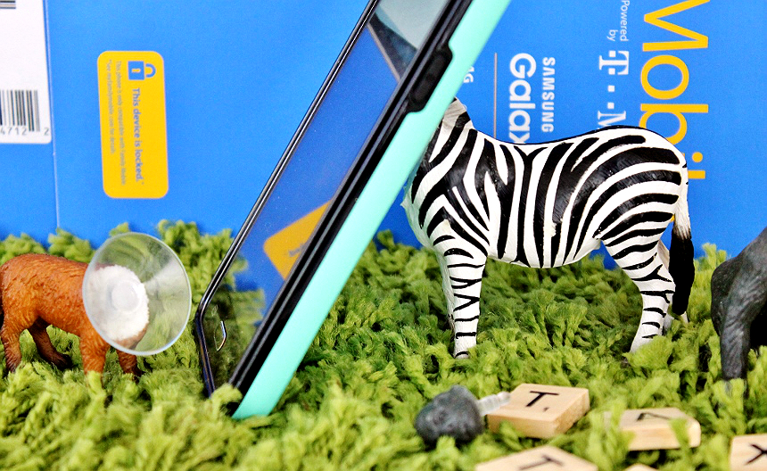 Turn children's animal action figures into handmade smartphone stands and charms in this easy D.I.Y. #YourTaxCash #AD