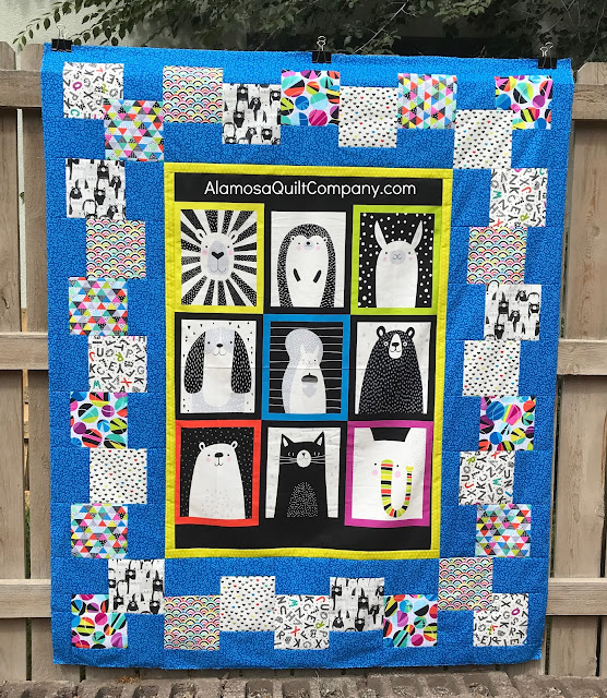 Black/White/Bright shop sample using Quilter's Palette pattern