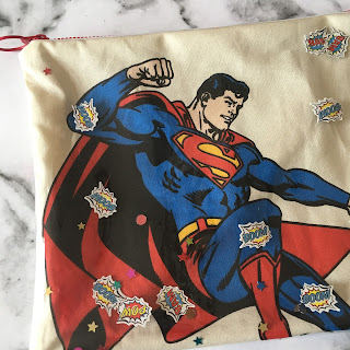 Close up of Superman fabric and boom confetti