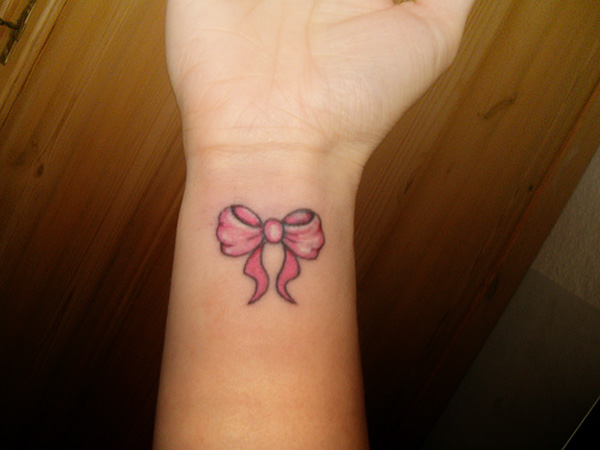 ribbon bow tattoo. pink ow tattoos. the ow