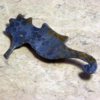 Handmade rustic sea horse brooch