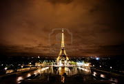 Paris Eiffel Tower at Night (paris france november the eiffel tower lit at night in paris france the most visited monume)