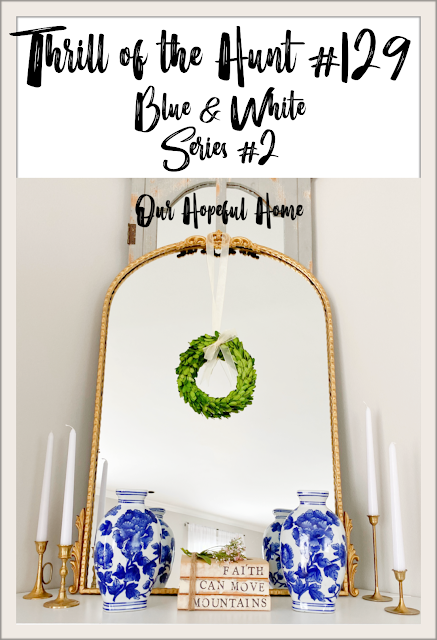 gilded mantel mirror with blue and white china
