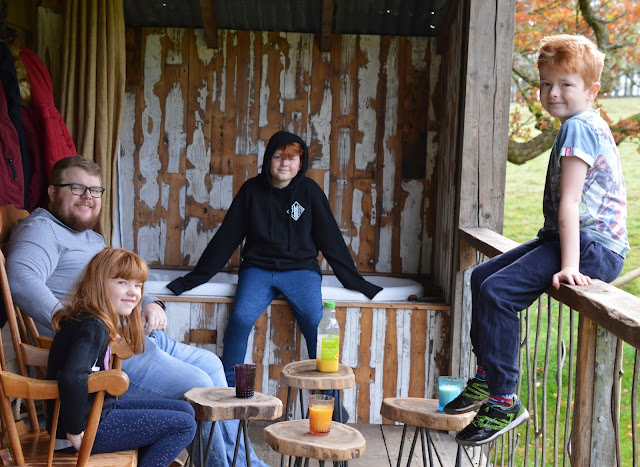 Experience Northumberland's Dark Skies with a Stay at Hesleyside Huts  - family time on the deck