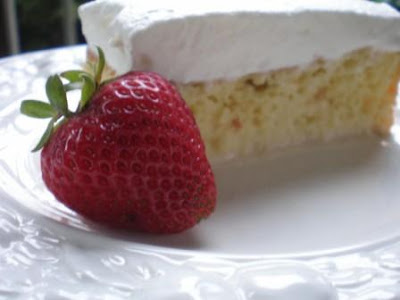 Tres Leches Cake is a dense sponge cake that is soaked in a milk mixture of