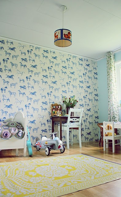 think the horse wallpaper, found here , would be such a great accent ...