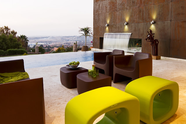 Green and Brown poolside furniture 