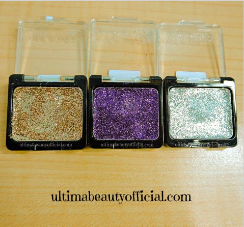 Three Wet n Wild Color Icon Glitter singles opened (Gold, Purple, Silver)