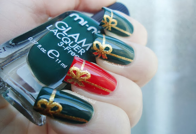 Christmas packages with ribbon nail art