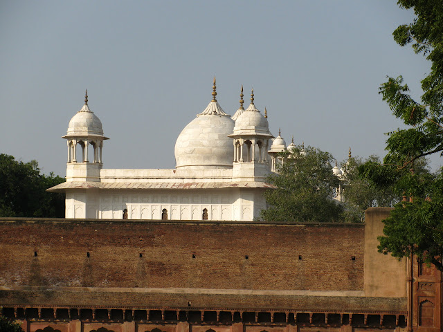 white marble buildings with domes