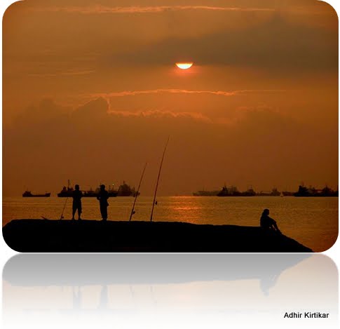 Anglers fishing at sunrise at East Coast Park