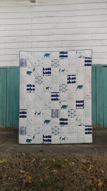 Little man woodland themed teal, navy, and gray baby quilt