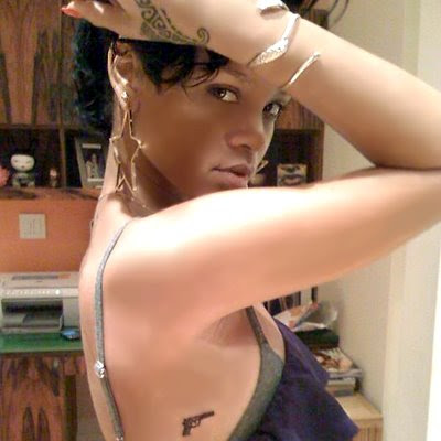 rihanna tattoos shh. Rihanna#39;s tattoo artist