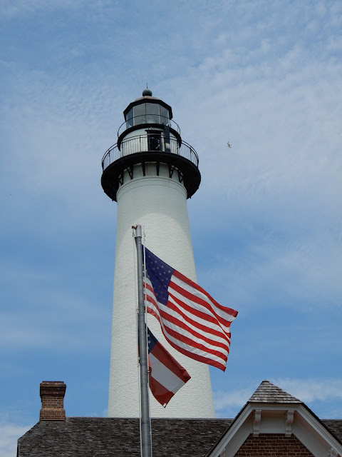 lighthouse and flags