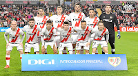 RAYO VALLECANO DE MADRID. Temporada 2021-22. Santi Comesaña, Nikola Maraš, Alejandro Catena, Radamel Falcao, Stole Dimitrievski. Isi Palazón, Unai López, Óscar Valentín, Fran García, Álvaro García, Balliu. RAYO VALLECANO DE MADRID 0 REAL CLUB CELTA DE VIGO 0. Lunes, 01/11/2021, 18:30 horas. Campeonato de Liga de 1ª División, jornada 12. Madrid, estadio de Vallecas: 9.580 espectadores. Árbitro: Guillermo Cuadra Fernández, Baleares; VAR: David Medié Jiménez, Cataluña. Entrenadores: Rayo Vallecano: Andoni Iraola; Celta: Eduardo Coudet.