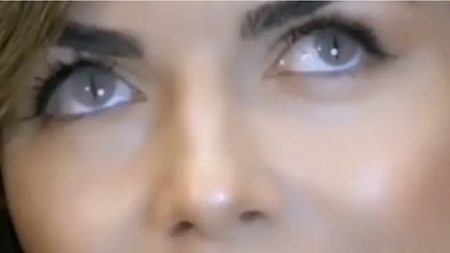 Anunnaki woman who has Reptilian-like slits in her eye's on a Russian TV show.