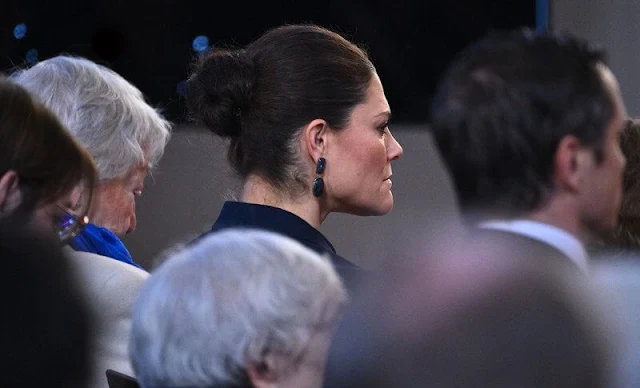 Crown Princess Victoria wore a Ruma navy blazer by Tiger of Sweden, and a navy pleated skirt by H&M