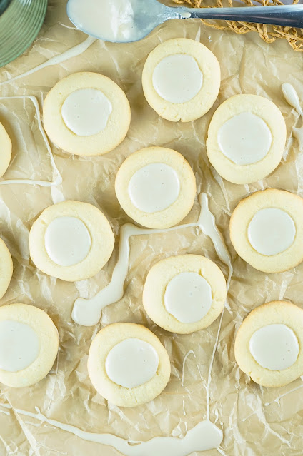 cookies lined up on brown parchment paper background.