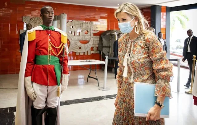 Queen Maxima wore a samera multi-coloured floral top and samera pleated skirt by Alexis