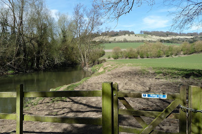 Nowhere else to go, locked gate view with cross to Box Hill