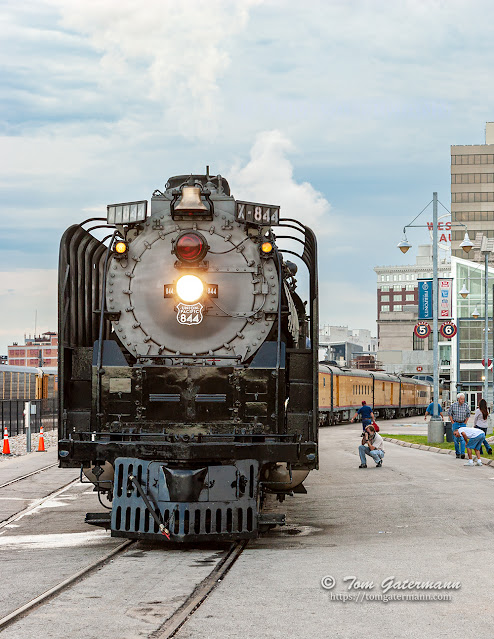Onlookers view and photograph UP 844 before it departs Kansas City, Missouri.