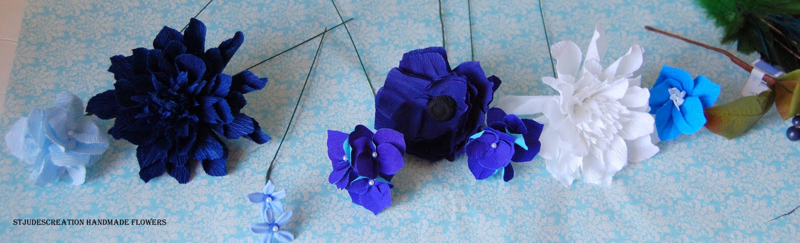 Blue wedding bouquet sampler with delphinium with peacock feather cobalt