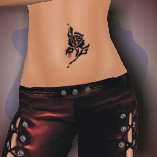 Nice lil belly black rose tattoo right on the belly well I think it's the