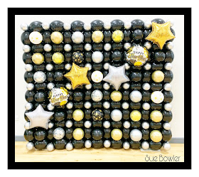 Black, Gold, and Silver New Years Eve Balloon Wall by Sue Bowler