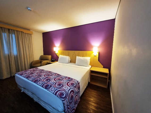 Foto de um quarto confortável no Hotel Comfort Nova Paulista