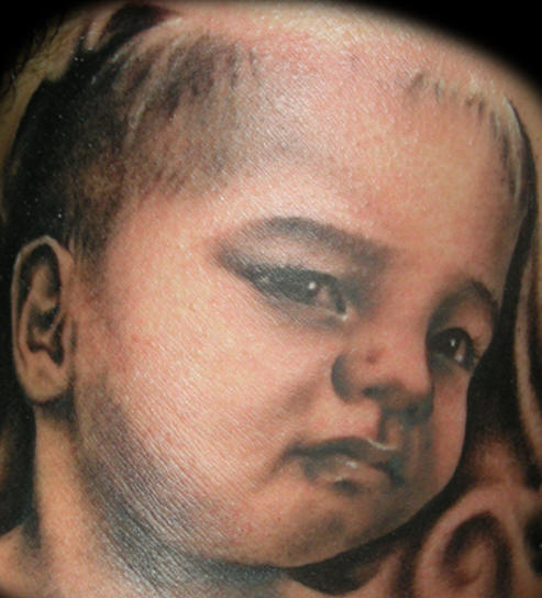 Cute baby tattoo.