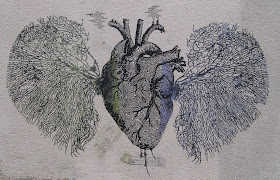 Heart and lungs graffiti in Paris