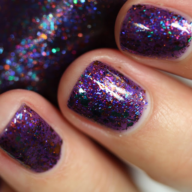 purple nail polish with multi chrome flakes