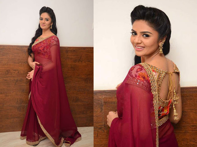 Srimukhi in Designer Red Saree Stills At Pelli Choopulu Audio Launch