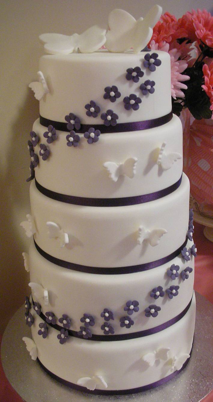 purple and white wedding cakes