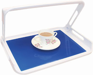 a white tray with a single handle over the top