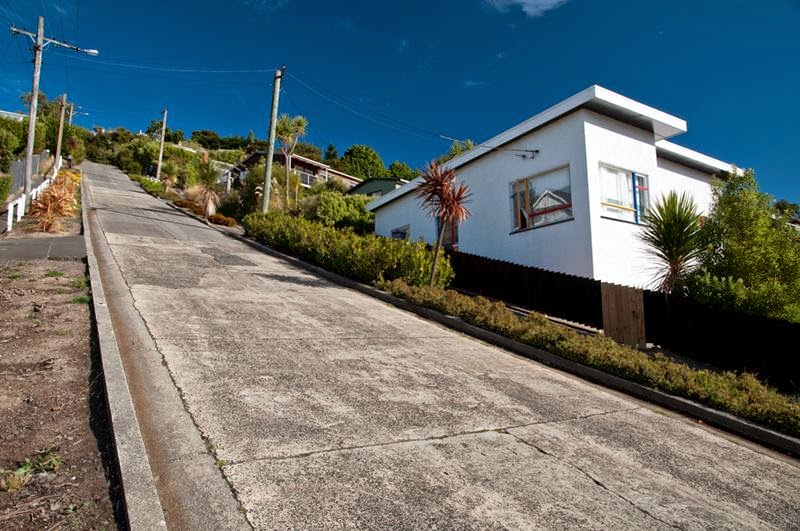 The world's steepest urban street, Baldwin Street, in Dunedin, New Zealand. Its slope reaches 35 percent or 19°, Which means that the distance 2.86 meters road rises by one meter. Baldwin Street is located in the North East Valley. 