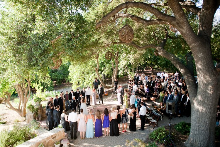 Unique ways to enter a wedding ceremony Officiant groom and groomsmen 