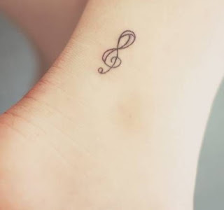 Small treble clef tattoo_0000070