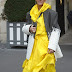 Céline Dion Has ANOTHER Bizarre Fashion Moment In Yellow Hooded Dress