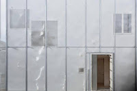 The Phenomenon House Wrapped with Stainless Steel Net as Security System