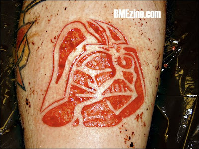 scarification tattoo. Scarification Tattoos