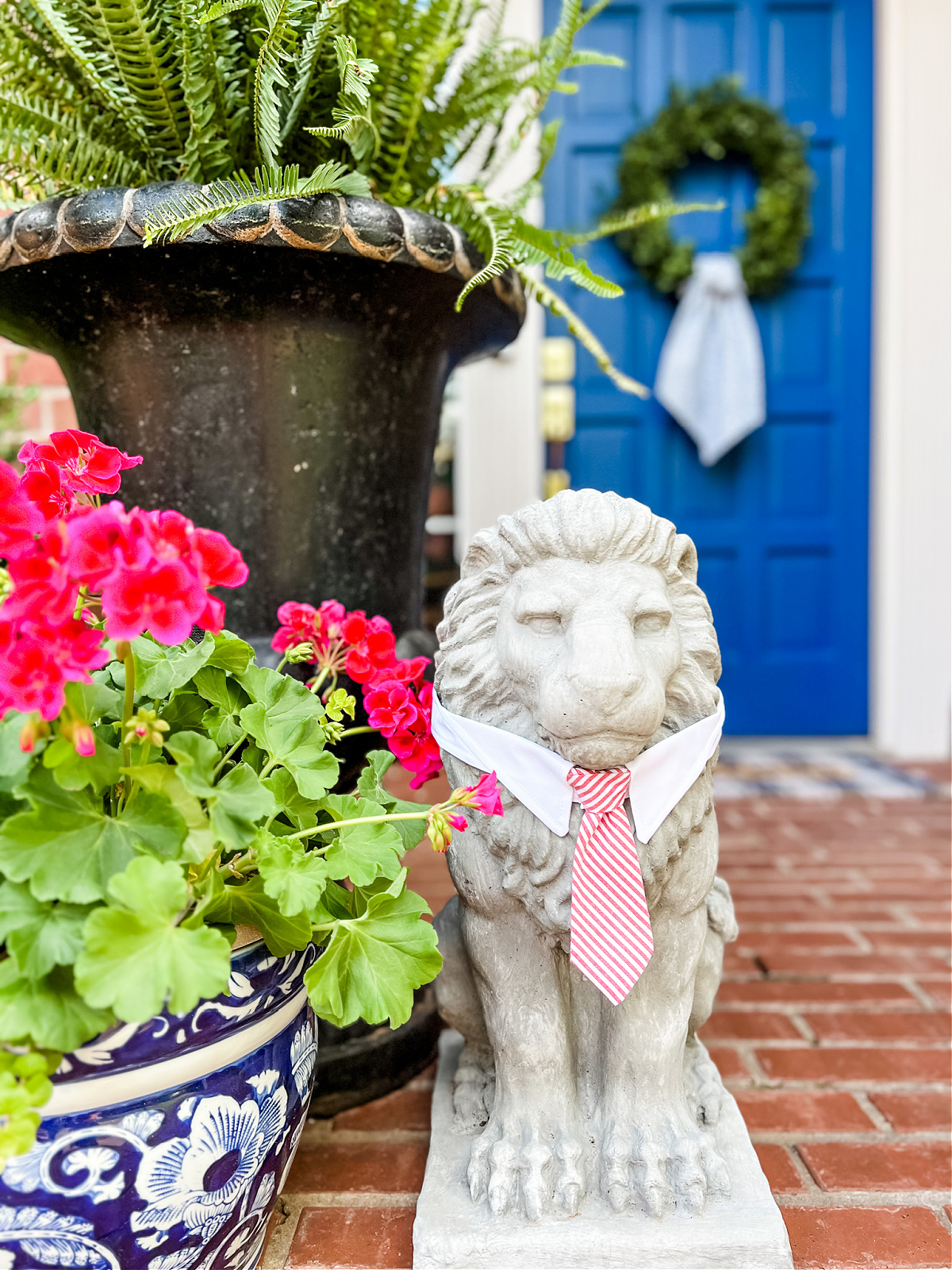 Concrete Lion with Pet Collar that looks like a necktie  added to Neck