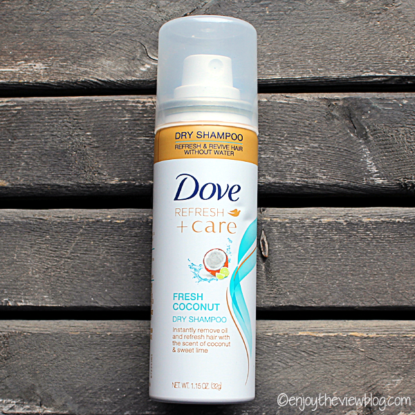 can of Dove Coconut dry shampoo lying on a table