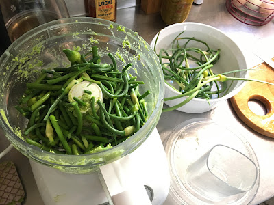 chopped garlic scapes in food processor