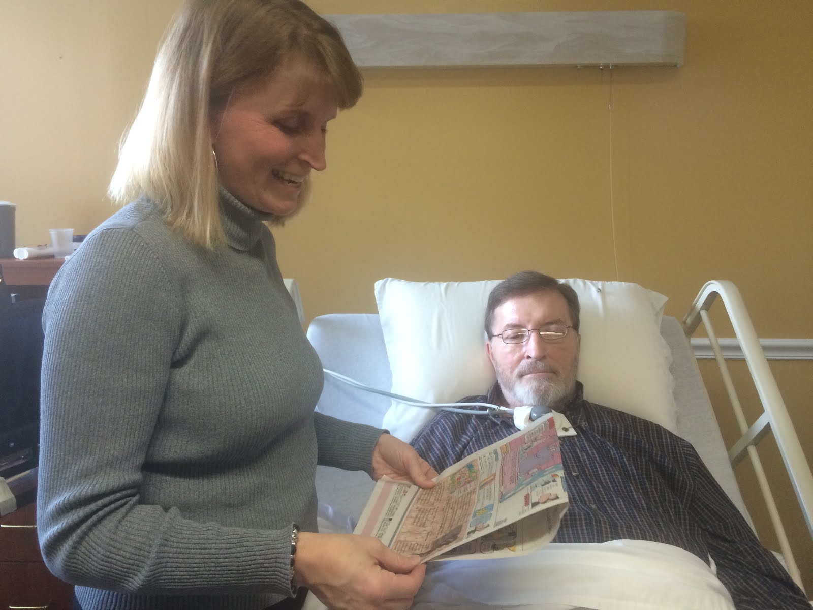 Reading Sunday comics with Becky
