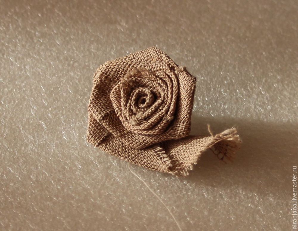 How easy and quick to sew a rose from a fabric or satin ribbon.