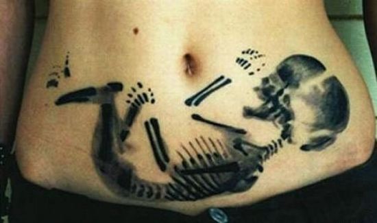 X-Ray baby stomach tattoo.